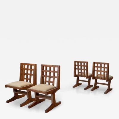 Set of Four Oak Dining Chairs with Geometric Backs Europe Mid 20th Century