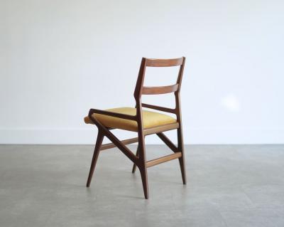 Set of Four Sculpted Walnut Dining Chairs Italy 1970s