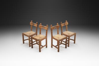 Set of Four Wood and Woven Rush Dining Chairs Europe ca 1950s