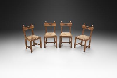 Set of Four Wood and Woven Rush Dining Chairs Europe ca 1950s