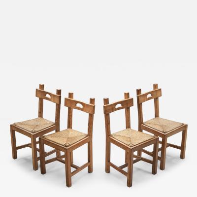 Set of Four Wood and Woven Rush Dining Chairs Europe ca 1950s