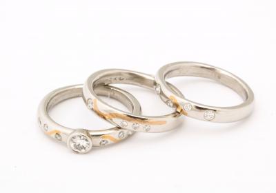 Set of Platinum Stacking Bands with Diamonds and Inlaid Gold