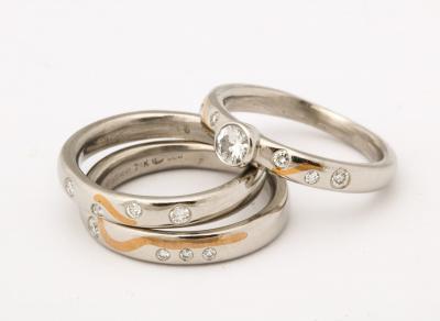 Set of Platinum Stacking Bands with Diamonds and Inlaid Gold
