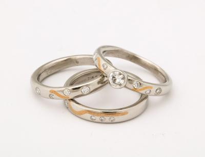 Set of Platinum Stacking Bands with Diamonds and Inlaid Gold
