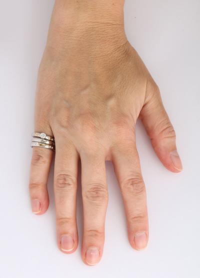 Set of Platinum Stacking Bands with Diamonds and Inlaid Gold