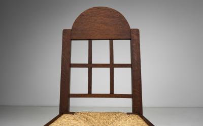 Set of Six Oak and Straw Dining Chairs with Geometric Backs Spain ca 1930s