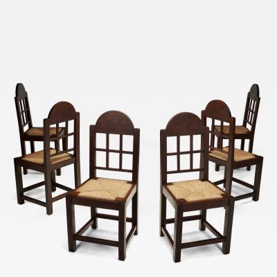 Set of Six Oak and Straw Dining Chairs with Geometric Backs Spain ca 1930s