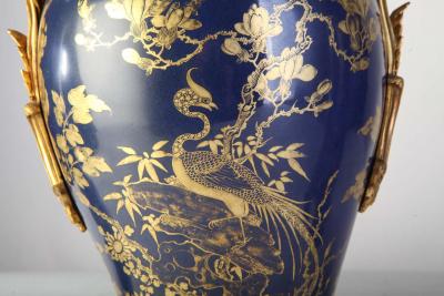 Set of Three Chinese Powder Blue Gilt Decorated Vases