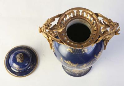 Set of Three Chinese Powder Blue Gilt Decorated Vases