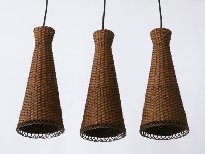 Set of Three Lovely Mid Century Modern Rattan Diabolo Pendant Lamps 1960s