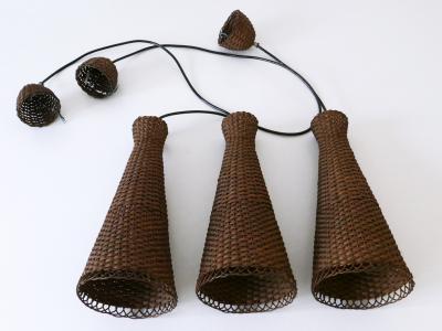 Set of Three Lovely Mid Century Modern Rattan Diabolo Pendant Lamps 1960s