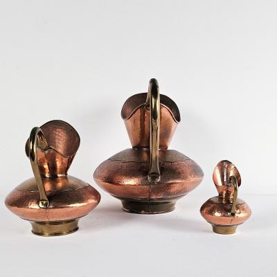Set of Three Vintage Copper Pitchers
