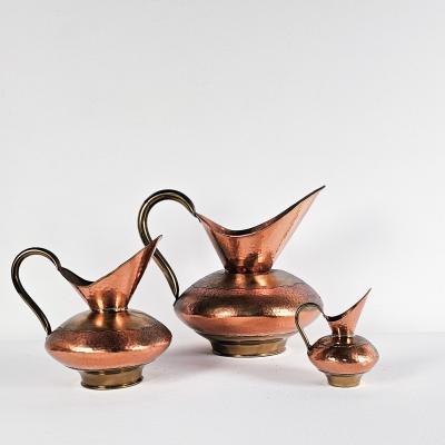 Set of Three Vintage Copper Pitchers