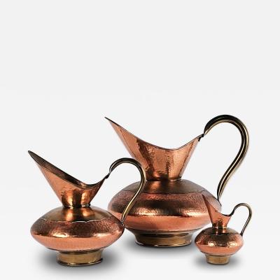 Set of Three Vintage Copper Pitchers