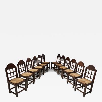 Set of Twelve Oak and Straw Dining Chairs with Geometric Backs Spain ca 1930s