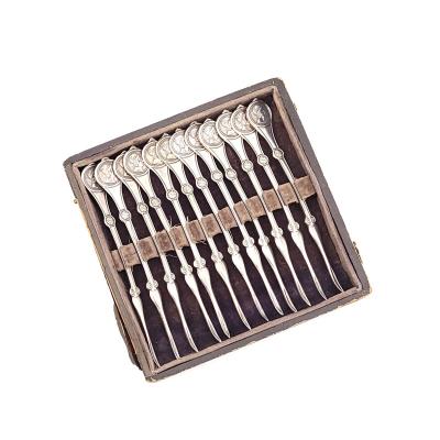 Set of Twelve Reed Barton Medallion Nut Picks in Sterling