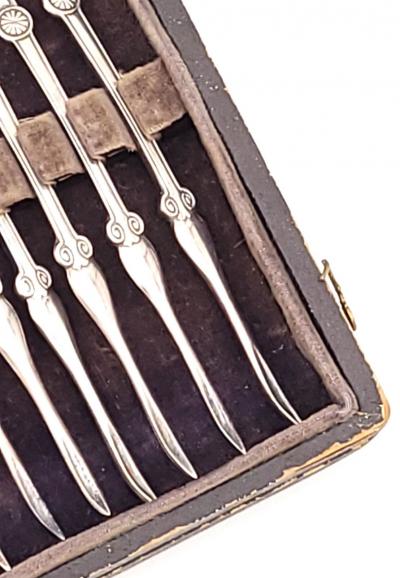 Set of Twelve Reed Barton Medallion Nut Picks in Sterling