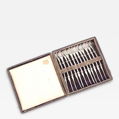 Set of Twelve Reed Barton Medallion Nut Picks in Sterling