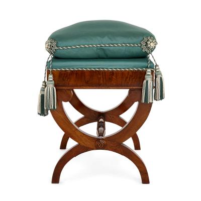 Set of four 19th century upholstered walnut X frame stools