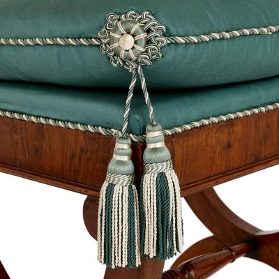 Set of four 19th century upholstered walnut X frame stools