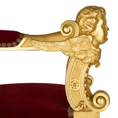 Set of four Baroque style carved giltwood and velvet throne armchairs