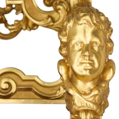 Set of four Baroque style carved giltwood and velvet throne armchairs