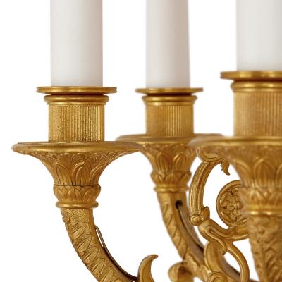 Set of four Empire style ten branch gilt bronze sconces