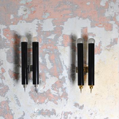 Set of four black lacquered brass wall sconces by Lumi re Bologna 1960s