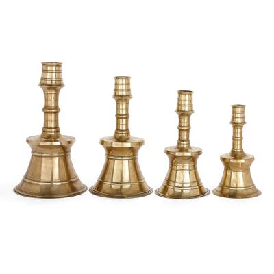 Set of four cast and turned brass Ottoman candlesticks