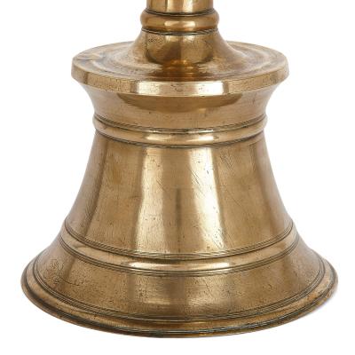 Set of four cast and turned brass Ottoman candlesticks