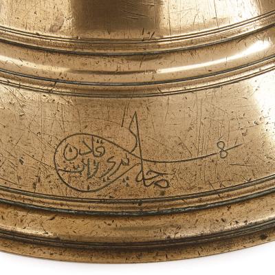 Set of four cast and turned brass Ottoman candlesticks