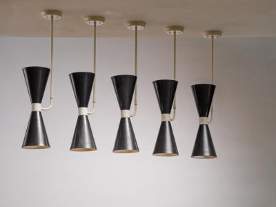 Set of four diabolo pendants