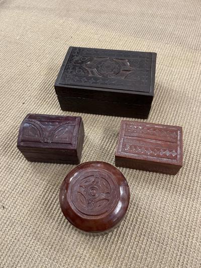 Set of four hand made leather boxes