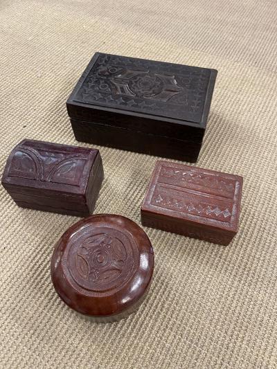 Set of four hand made leather boxes
