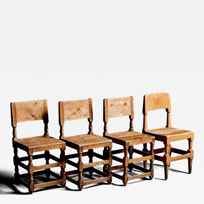 Set of four rustic pinewood chairs