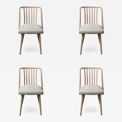 Set of four whitewashed Thonet chairs