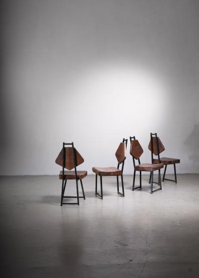 Set of four wood and iron chairs