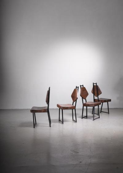 Set of four wood and iron chairs