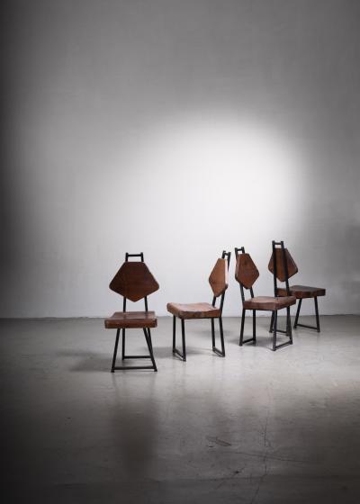 Set of four wood and iron chairs