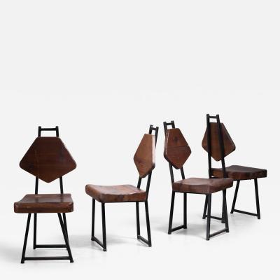 Set of four wood and iron chairs