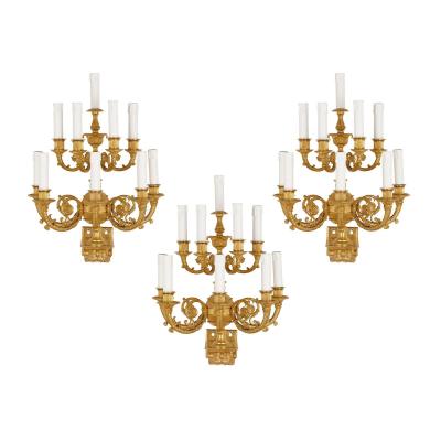 Set of three Neoclassical gilt bronze wall lights