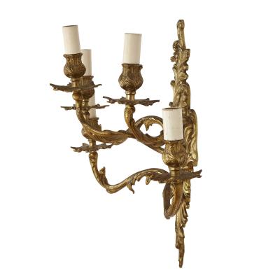 Set of three gilt bronze sconces in the Baroque style