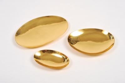 Set of three handmade cast brass trays