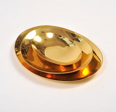 Set of three handmade cast brass trays