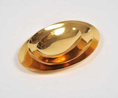 Set of three handmade cast brass trays