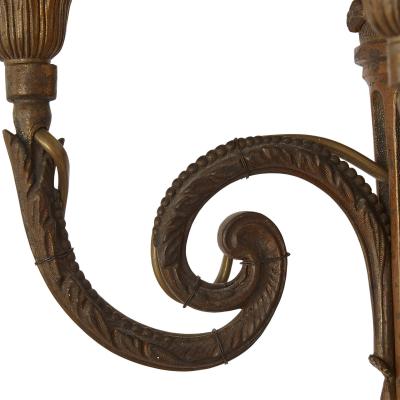 Set of three metal sconces in the Neoclassical style