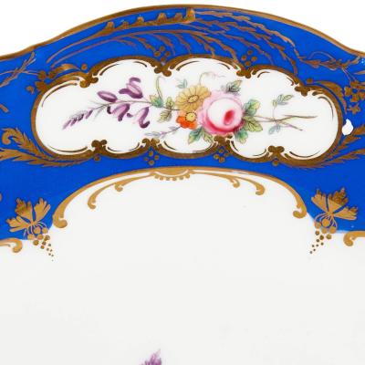 Set of twenty four blue and white floral porcelain dinner plates