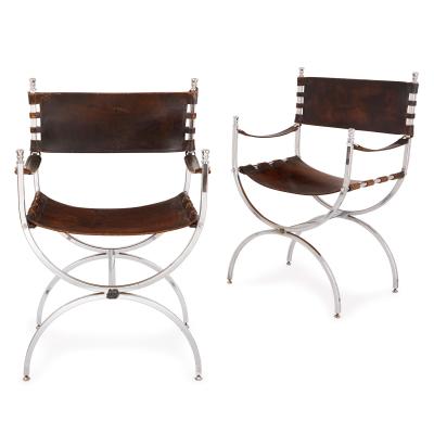 Set of two Mid Century Modern silvered and leather chairs