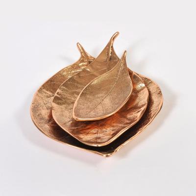 Set ot three bronze leaf bowls