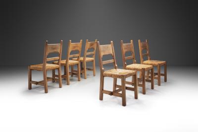 Six Brutalist Dining Chairs with Rush Seats Europe ca 1960s